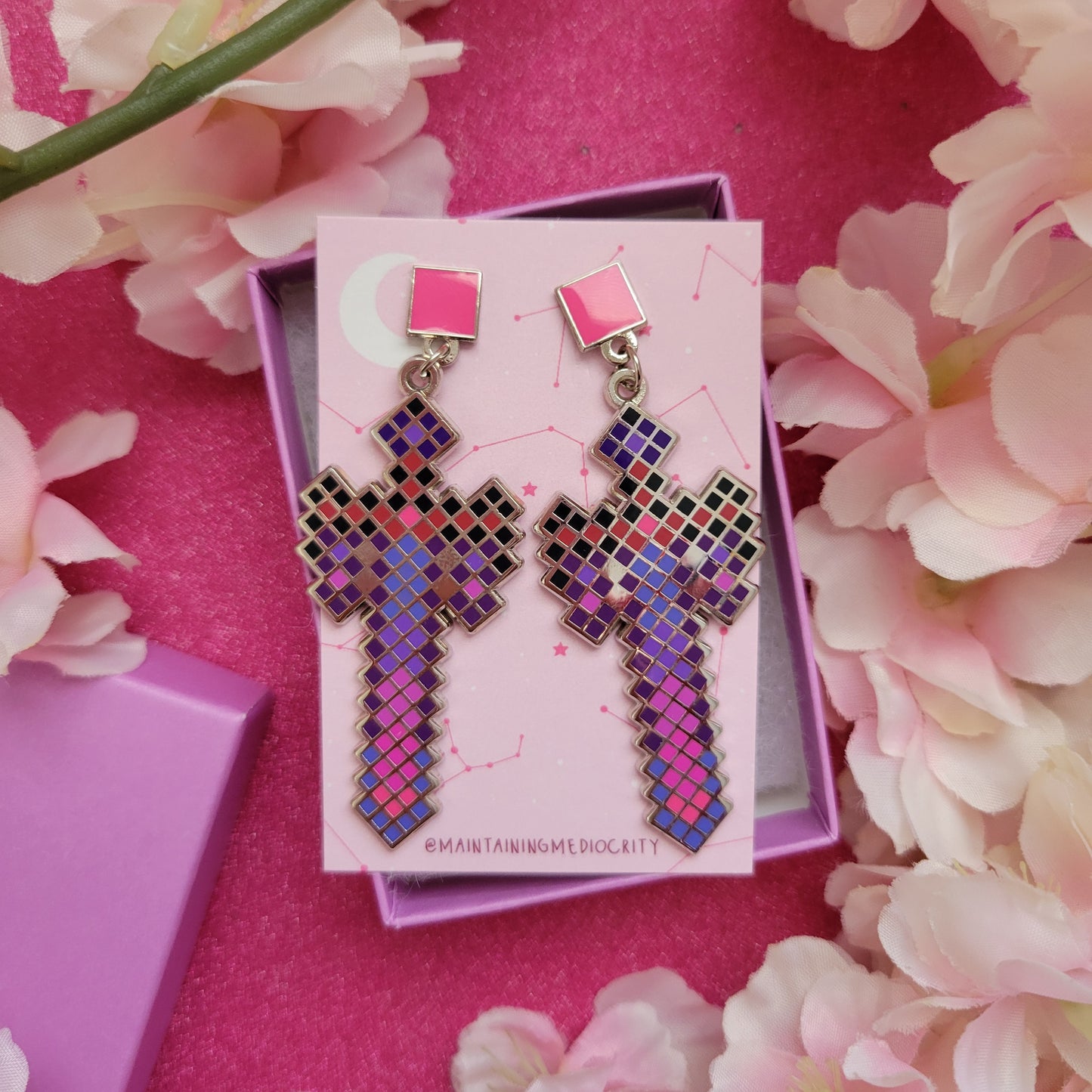 Infinity blade stud earrings