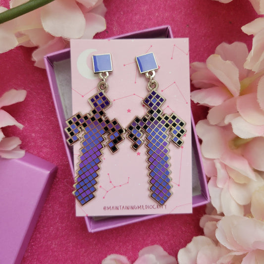 Galaxy sword stud earrings